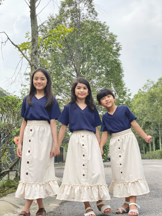Mallory Buttoned Ruffle Skirt in Ivory
