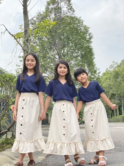 Mallory Buttoned Ruffle Skirt in Ivory